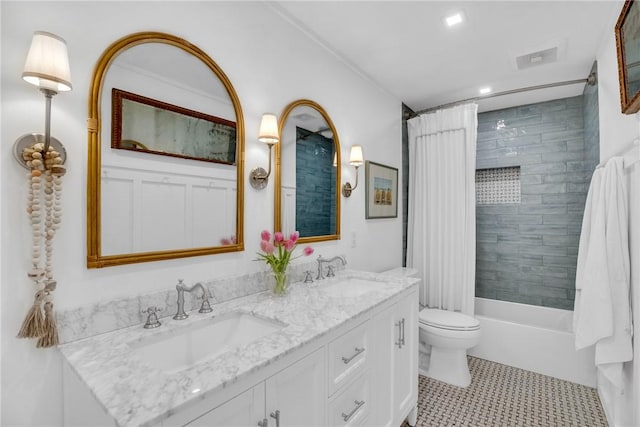 full bathroom with shower / tub combo with curtain, vanity, tile patterned flooring, and toilet