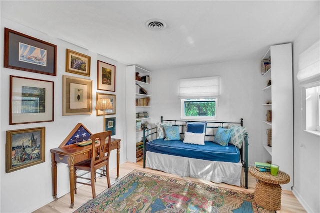 bedroom featuring light hardwood / wood-style floors