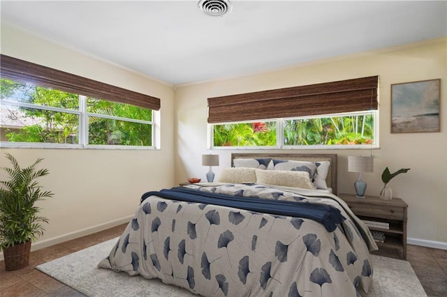 bedroom featuring ornamental molding