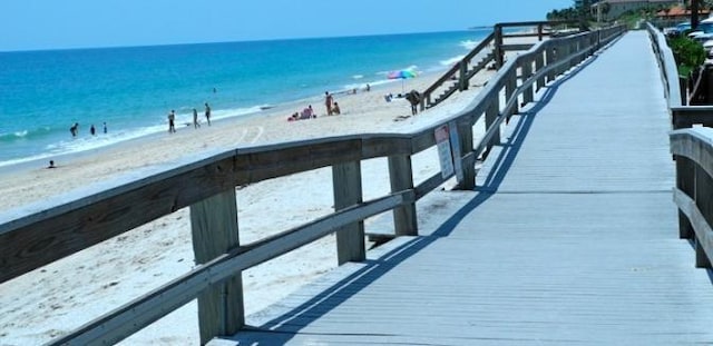 645 Royal Palm Pl, Vero Beach, FL 32960 - dock area featuring a water view and a view of the beach