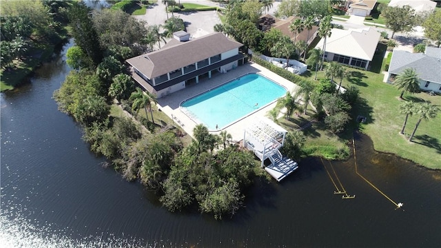 birds eye view of property with a water view