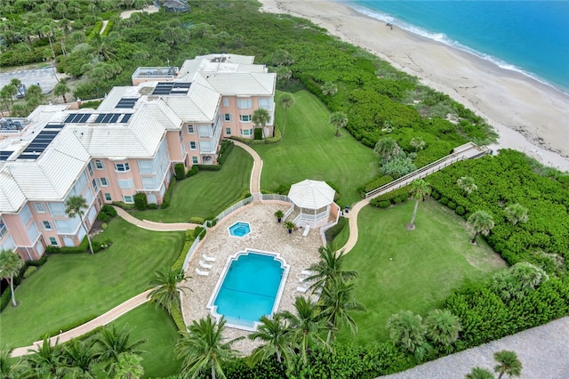 aerial view with a beach view and a water view