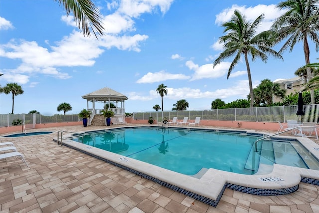 view of pool featuring a patio and a gazebo