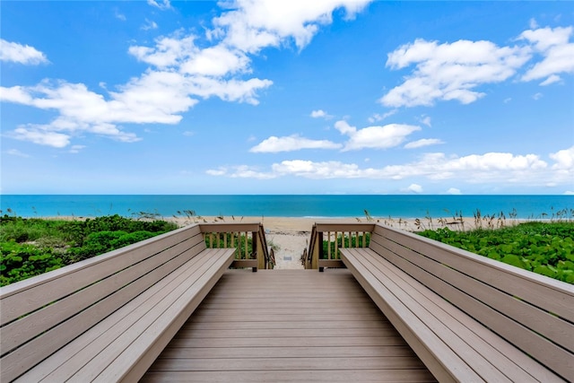 view of community with a view of the beach and a water view