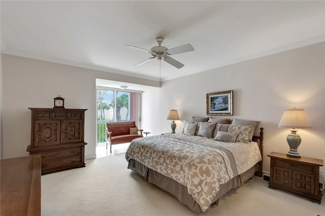 carpeted bedroom with ceiling fan and crown molding