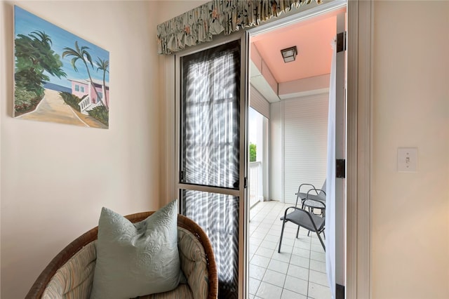 living area with light tile patterned floors