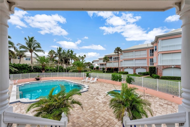 view of swimming pool featuring a patio area