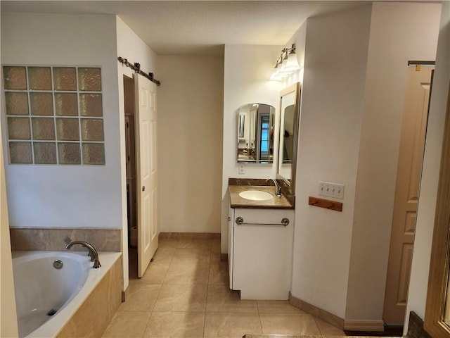 3865 8th Pl, Vero Beach, FL 32960 - bathroom with vanity, a bath, and tile patterned flooring