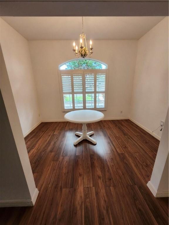 3865 8th Pl, Vero Beach, FL 32960 - unfurnished dining area featuring a chandelier and dark wood-style floors