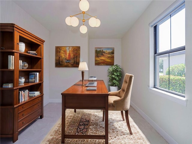 4348 Beauty Leaf Cir, Vero Beach, FL 32967 - office area featuring baseboards, a notable chandelier, and a healthy amount of sunlight