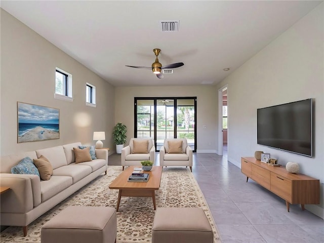 4348 Beauty Leaf Cir, Vero Beach, FL 32967 - living area featuring ceiling fan, visible vents, and baseboards