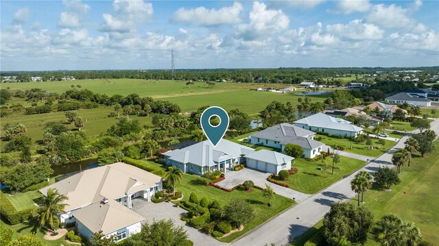 951 W Polo Grounds Dr, Vero Beach, FL 32966 - aerial view of residential area featuring a tree filled landscape and a nearby body of water