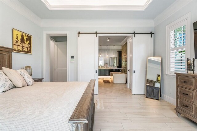 951 W Polo Grounds Dr, Vero Beach, FL 32966 - bedroom with a barn door, crown molding, and ensuite bath