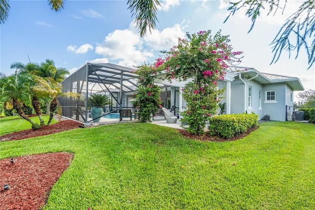 951 W Polo Grounds Dr, Vero Beach, FL 32966 - back of property with stucco siding, a patio, a lawn, and a standing seam roof