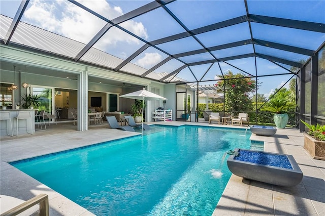 951 W Polo Grounds Dr, Vero Beach, FL 32966 - view of swimming pool with a patio, outdoor lounge area, a lanai, and a pool with connected hot tub