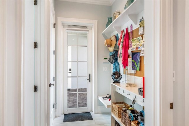 951 W Polo Grounds Dr, Vero Beach, FL 32966 - mudroom featuring light tile patterned flooring and ornamental molding