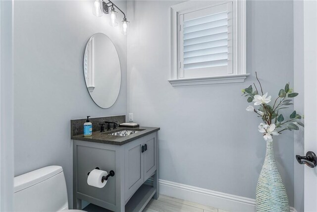 951 W Polo Grounds Dr, Vero Beach, FL 32966 - half bath with vanity and toilet