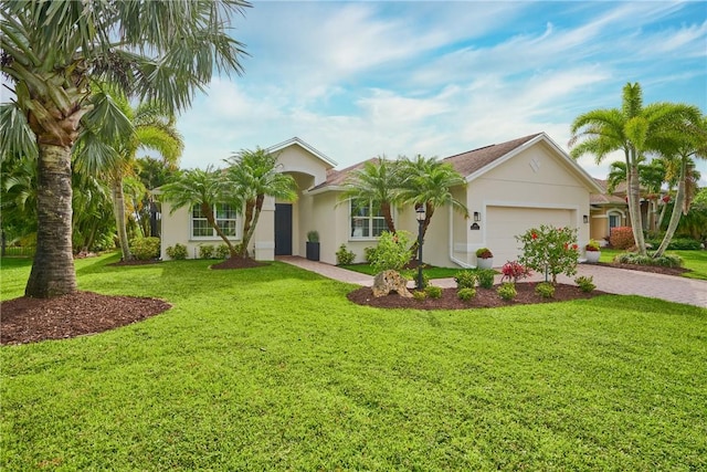 single story home with an attached garage, a front lawn, decorative driveway, and stucco siding