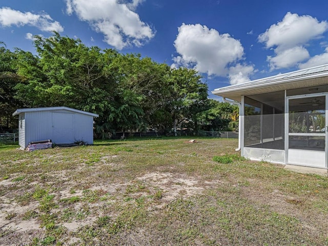 view of yard with a sunroom