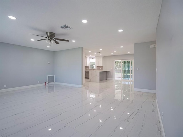 empty room featuring ceiling fan