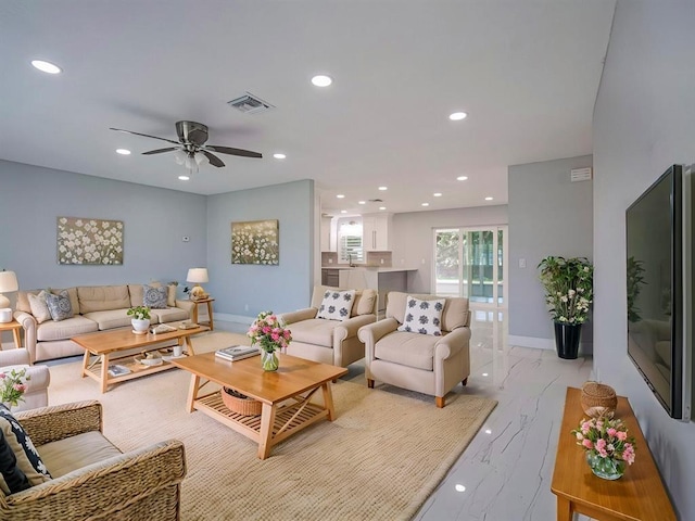 living room featuring ceiling fan