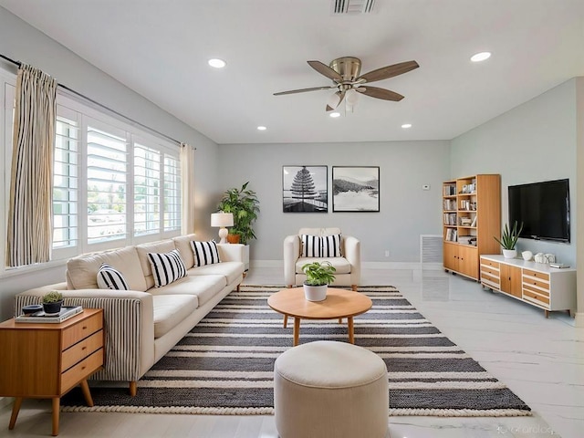 living room featuring ceiling fan