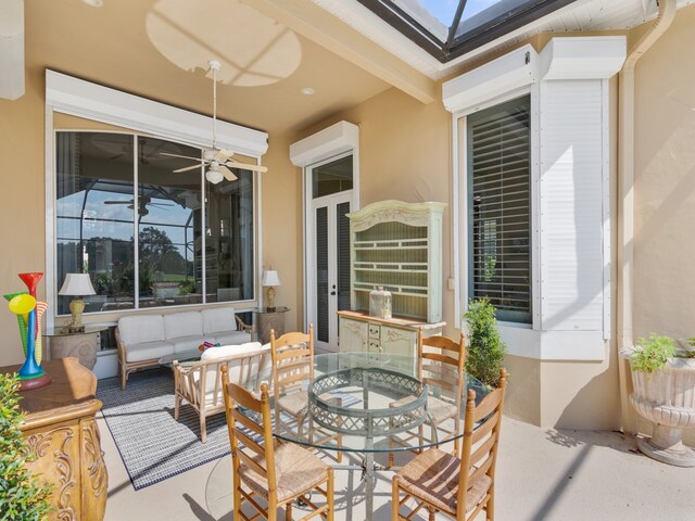 view of patio featuring ceiling fan and an outdoor hangout area