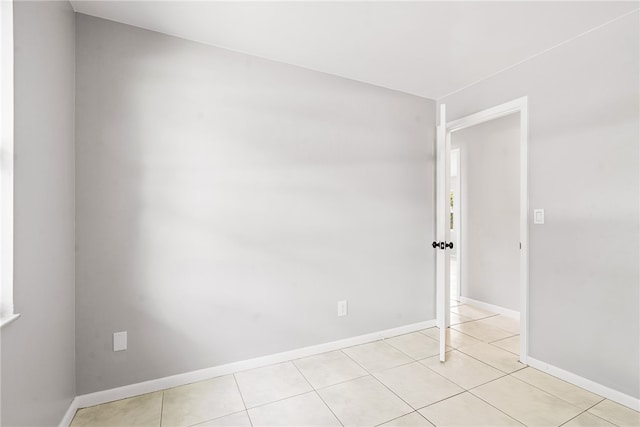 view of tiled spare room