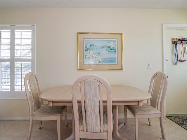 view of tiled dining space