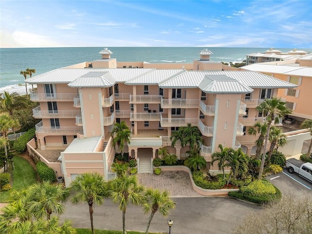 view of building exterior with a water view