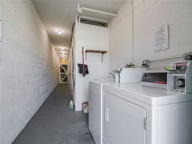 laundry room with washer and dryer