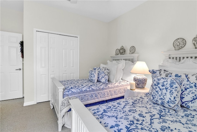 bedroom featuring a closet and carpet