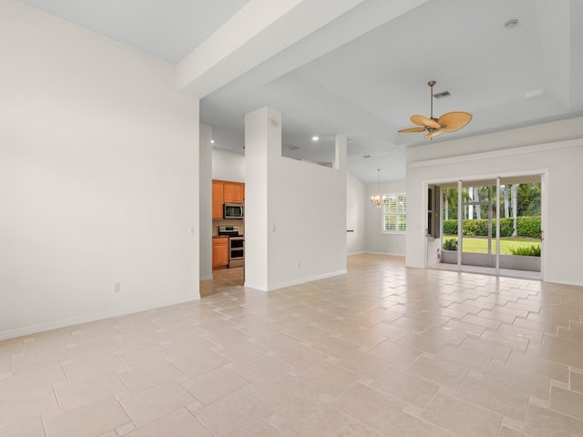 unfurnished living room with light tile patterned flooring and ceiling fan with notable chandelier