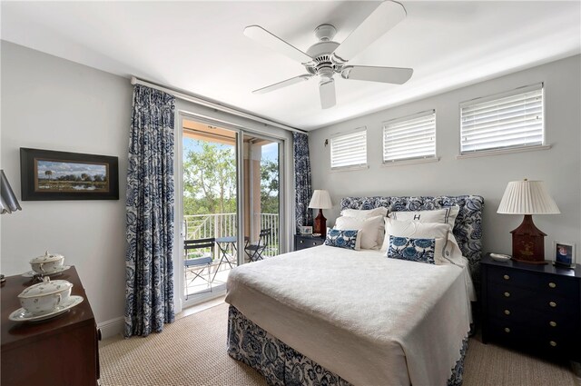 carpeted bedroom with ceiling fan and access to exterior