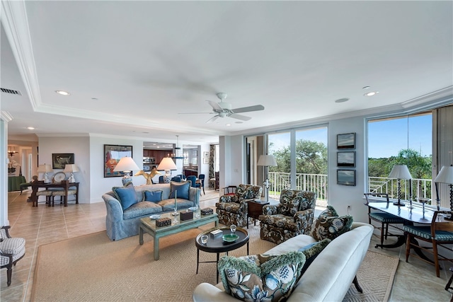 tiled living room featuring ceiling fan and crown molding