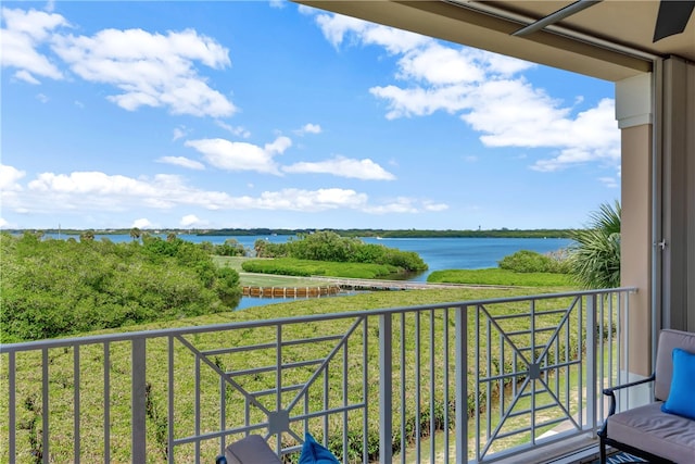 balcony featuring a water view