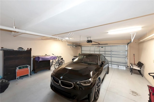 4878 S Harbor Dr Unit 301, Vero Beach, FL 32967 - garage featuring a garage door opener