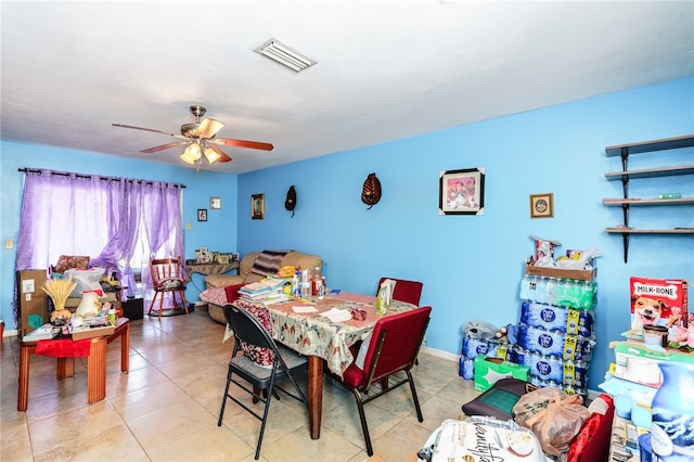 dining room featuring light tile patterned floors and ceiling fan