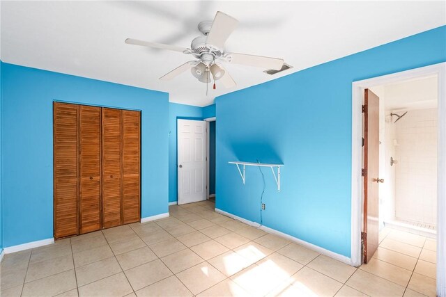 bathroom with vanity, tile patterned floors, and toilet