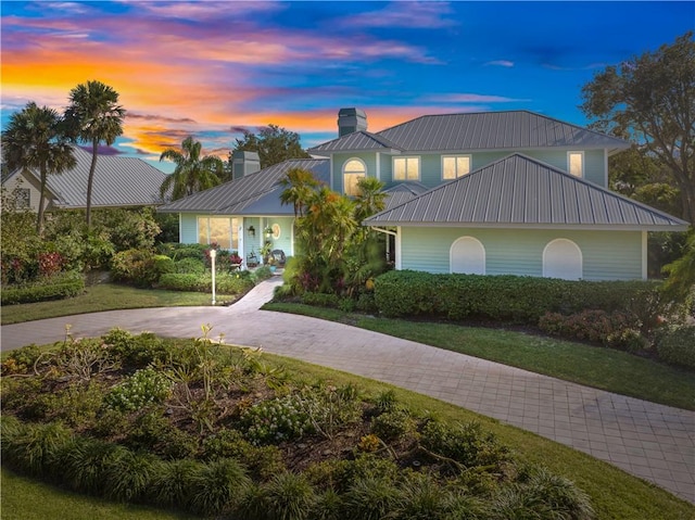 view of front of home featuring a yard