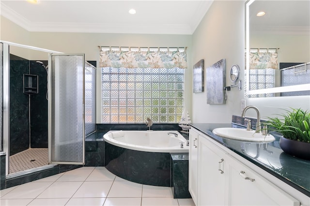 bathroom with crown molding, shower with separate bathtub, tile patterned floors, and vanity