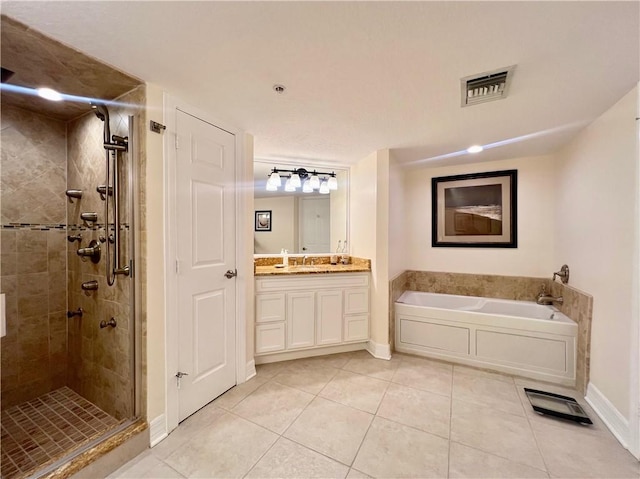 bathroom with vanity, tile patterned floors, and independent shower and bath