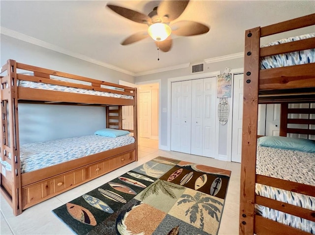 tiled bedroom featuring crown molding and ceiling fan