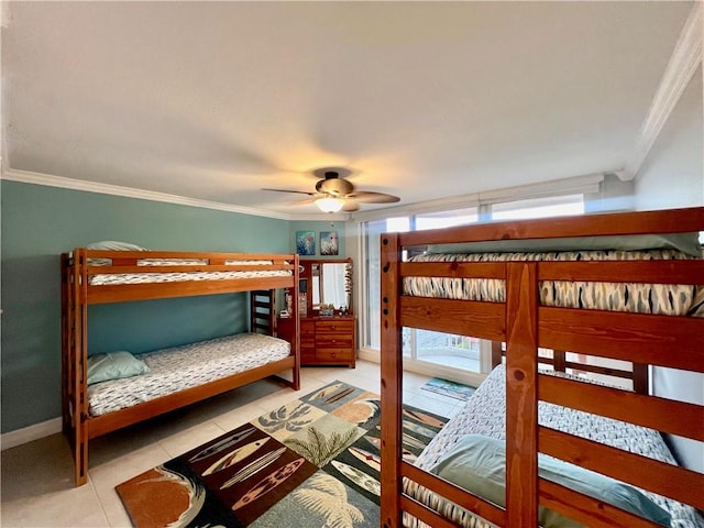 tiled bedroom with ceiling fan and ornamental molding