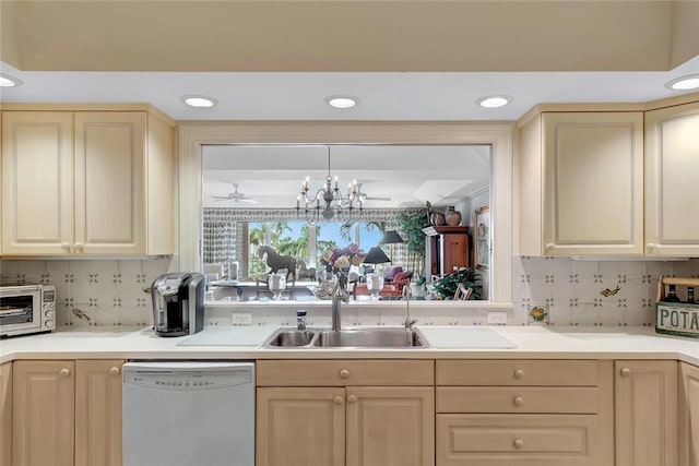 kitchen with an inviting chandelier, light brown cabinetry, white dishwasher, and decorative backsplash