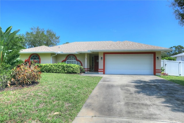 1158 Laconia St, Sebastian, FL 32958 - ranch-style house featuring concrete driveway, stucco siding, an attached garage, a front yard, and a gate