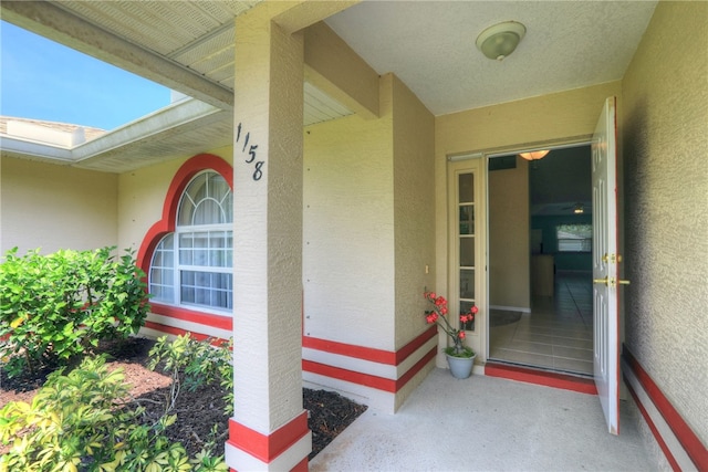 1158 Laconia St, Sebastian, FL 32958 - entrance to property featuring stucco siding