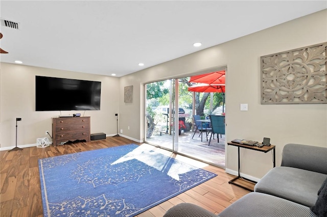 living room with hardwood / wood-style floors