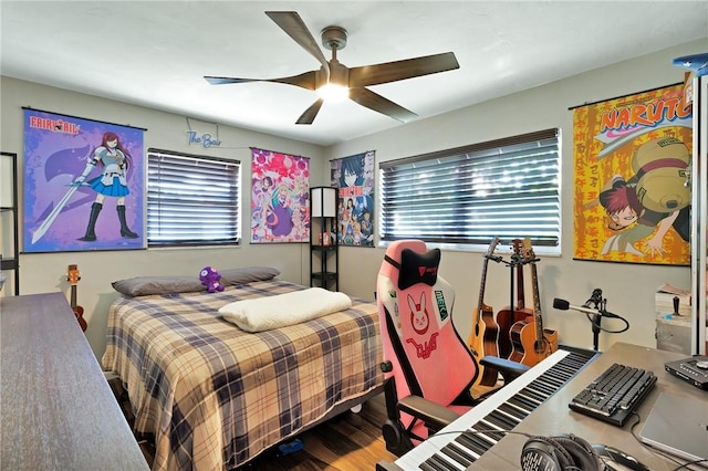 bedroom featuring ceiling fan and hardwood / wood-style floors