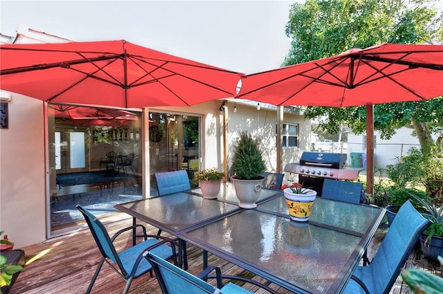 wooden deck with area for grilling